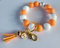 Image 1 of Game Day  Beaded wristlet keychain with pearlized focal bead 