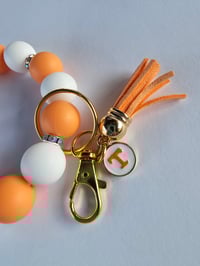 Image 3 of Game Day  Beaded wristlet keychain with pearlized focal bead 