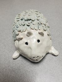 Image 1 of Curly