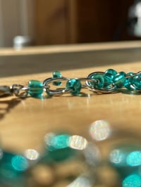 Image 1 of Teal glass beads and stainless steel bracelet 