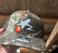 ERUCA STAR (REAL TREE CAMO) TRUCKER HAT