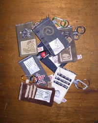 LIGHTER POUCHES BY COPINGMICE