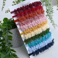 Image 1 of Row Of Bows