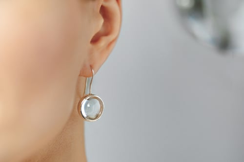 Image of " The Sun and The Moon" gold plated silver earrings with rock crystals · ET LUNA ET SOL ·