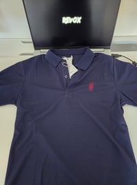 Image 1 of Polo