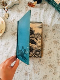 Image 4 of vintage book stack