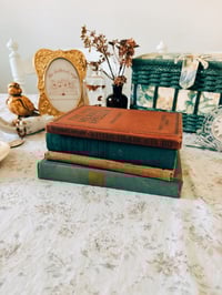 Image 1 of vintage book stack