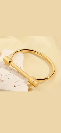 Image 1 of BANGLE BRACELET INTRICATE CLOSING