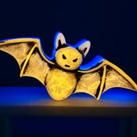 Image 2 of Bat- white to orange/violet glow