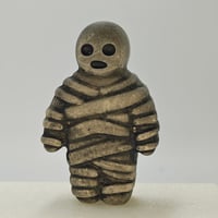 Image 1 of Mummy- white to orange/violet glow