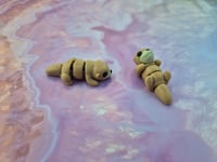 Image 1 of Mini Otters