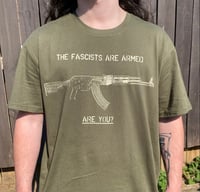 Image 1 of Armed