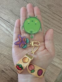 Image 4 of Stardew Valley Crops Wristlet and Junimo Stardrop Charm Keychain Set