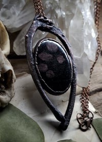Image 5 of Black Cat Rib Bone & Arfvedsonite Garnet Amulet