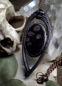 Image 2 of Black Cat Rib Bone & Arfvedsonite Garnet Amulet