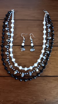 Image 5 of BEEHIVE SHELL STRAND W/BLACK AND WHITE BEADS 