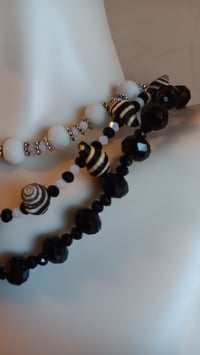 Image 7 of BEEHIVE SHELL STRAND W/BLACK AND WHITE BEADS 