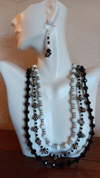 Image 6 of BEEHIVE SHELL STRAND W/BLACK AND WHITE BEADS 