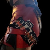 Image 3 of Red faux leather buckle zipper skirt w/ distressed studded strap