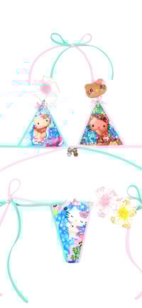 Image 2 of Tanned hellokitty on surfing mood 