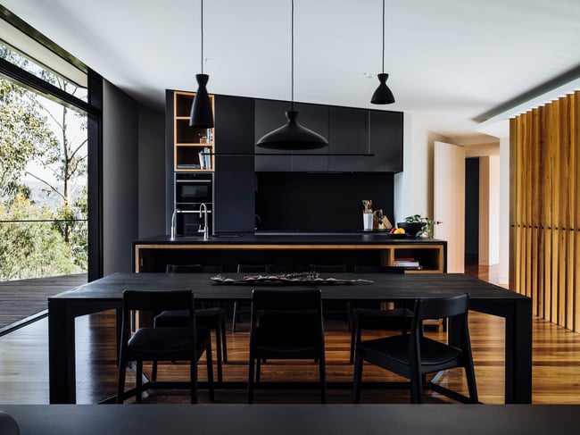 ROSE DINING CHAIR IN TORCHED TASMANIAN OAK WITH AN UPHOLSTERED LEATHER SEAT