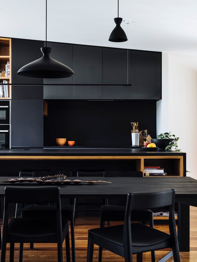 ROSE DINING CHAIR IN TORCHED TASMANIAN OAK WITH AN UPHOLSTERED LEATHER SEAT