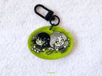Image 1 of green girls charm