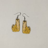 Image 1 of Istuva leopardi korvakorut