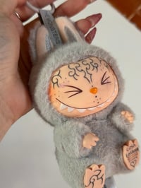 Image 3 of Hehe have a seat tattooed labubu