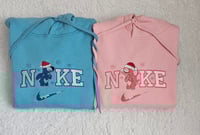 Image 1 of Stitchey and angela christmas hoodies