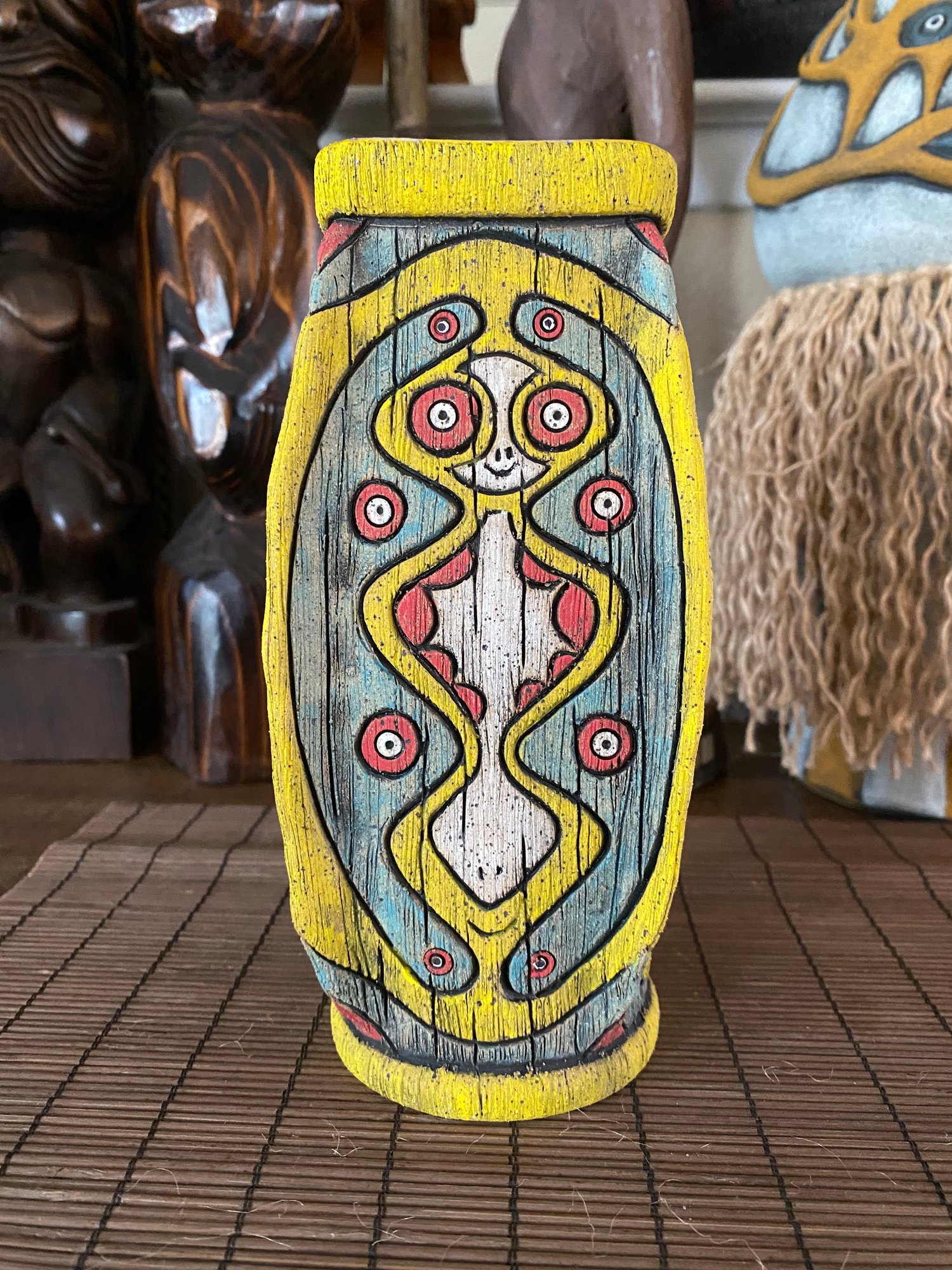 Image of Four Sided Turquoise, Yellow, & Red PNG Shield Mug - “The Happy Dancer” - US Shipping Included 