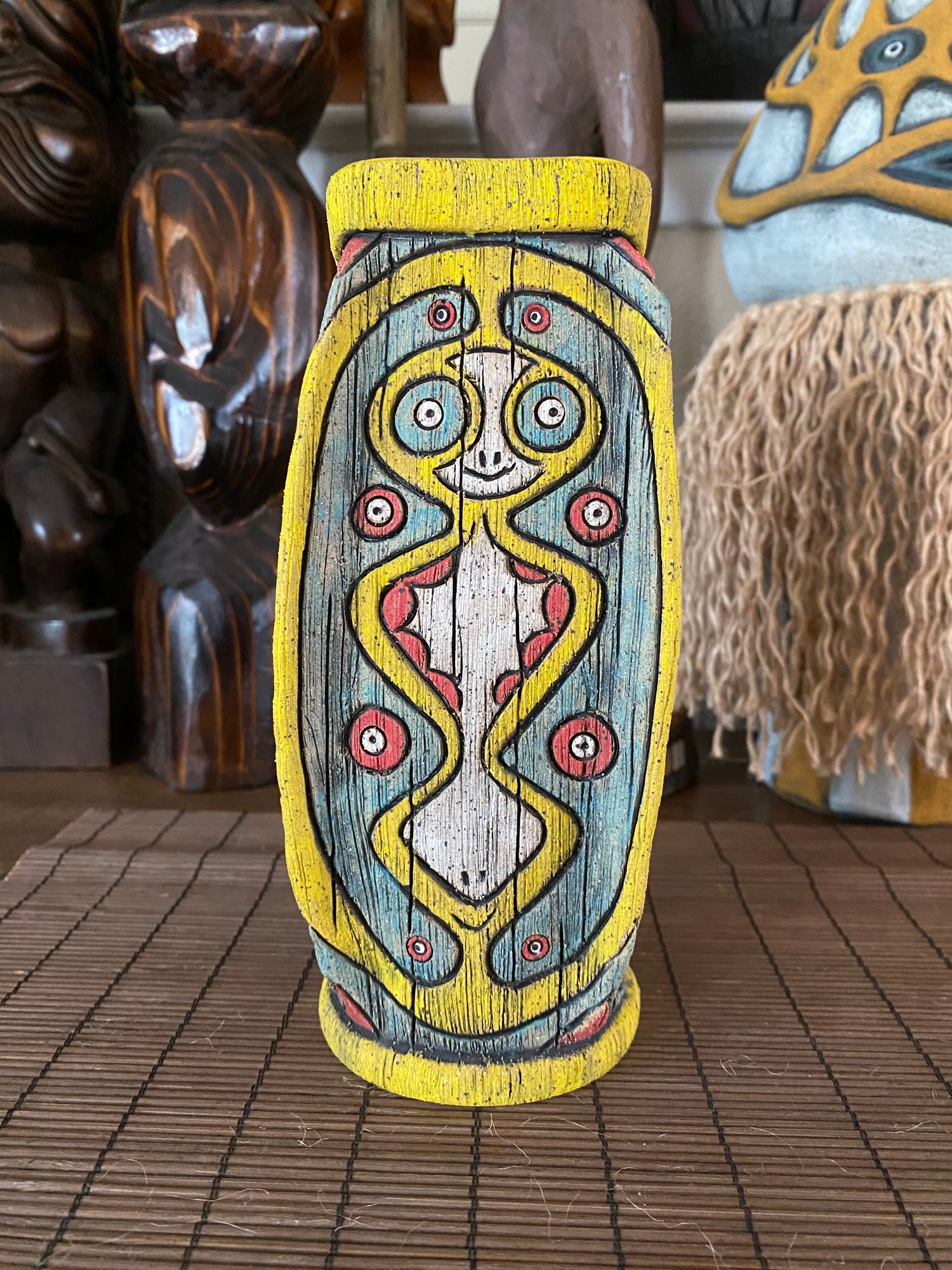 Image of Four Sided Turquoise, Yellow, & Red PNG Shield Mug - “The Happy Dancer” - US Shipping Included 