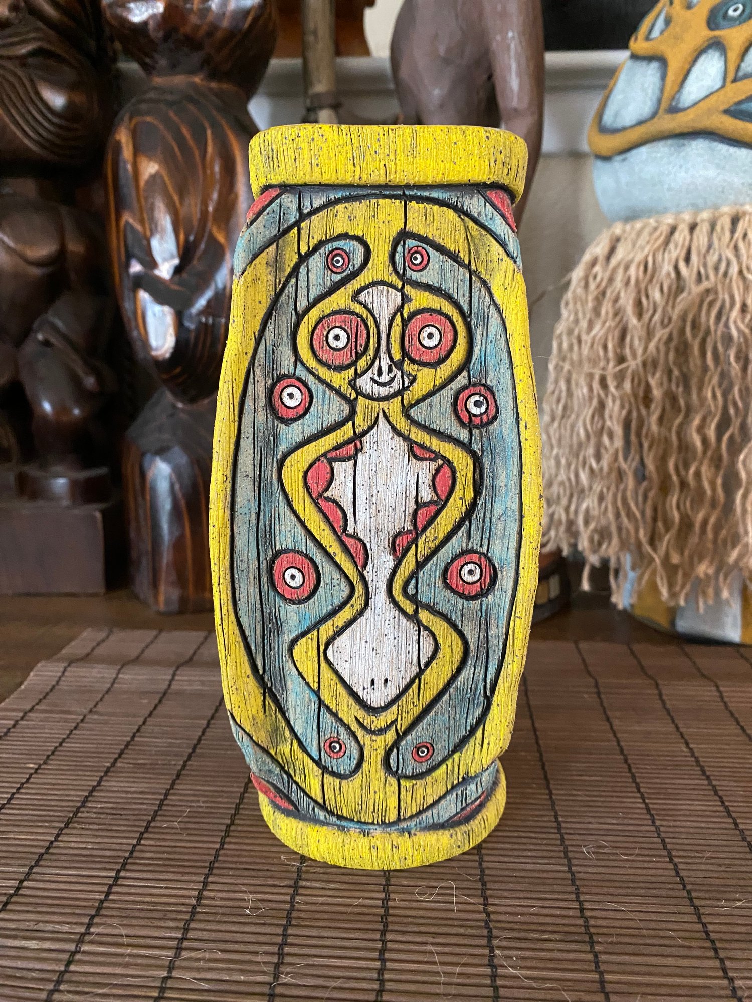 Image of Four Sided Turquoise, Yellow, & Red PNG Shield Mug - “The Happy Dancer” - US Shipping Included 