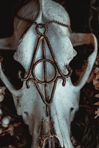 Image 1 of copper sigil