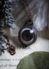 Image 5 of Prosthetic Eye Pendant - Brown