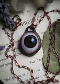 Image 4 of Prosthetic Eye Pendant - Brown