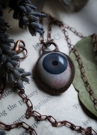 Image 1 of Prosthetic Eye Pendant - Gray Blue