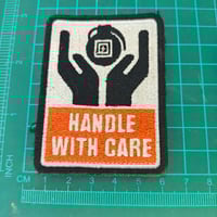 511 patch-handle with care 