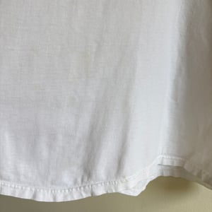 Image of The New York Times 'Expect the World' T-Shirt