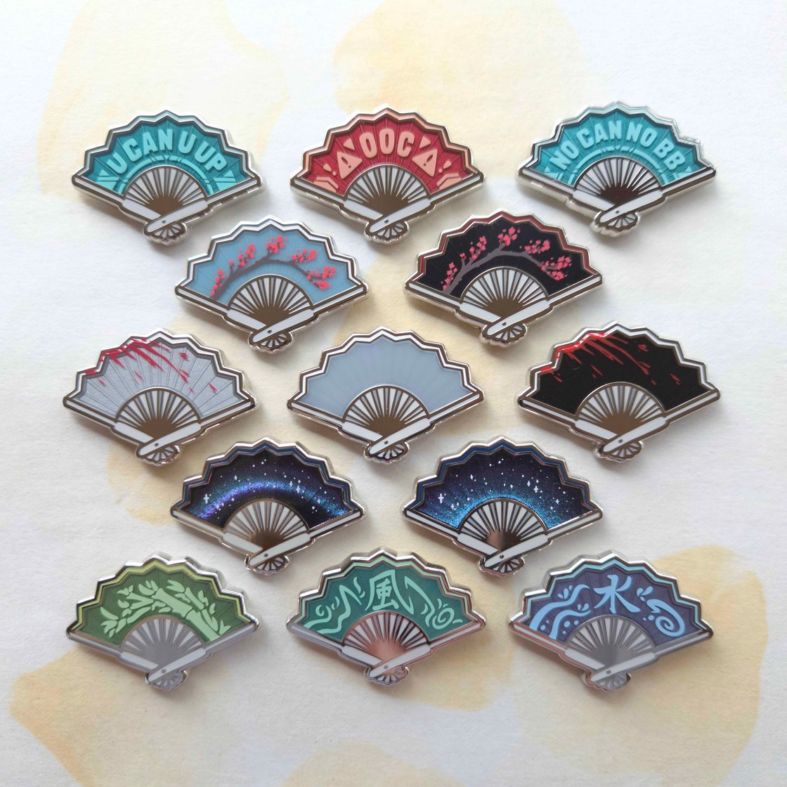 Image of Folding Fan Pins Re-run (In-hand)