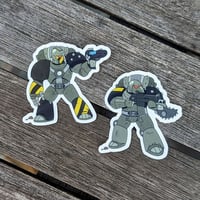 Image 1 of Battle Buddies! 2 inch Transparent Vinyl Stickers