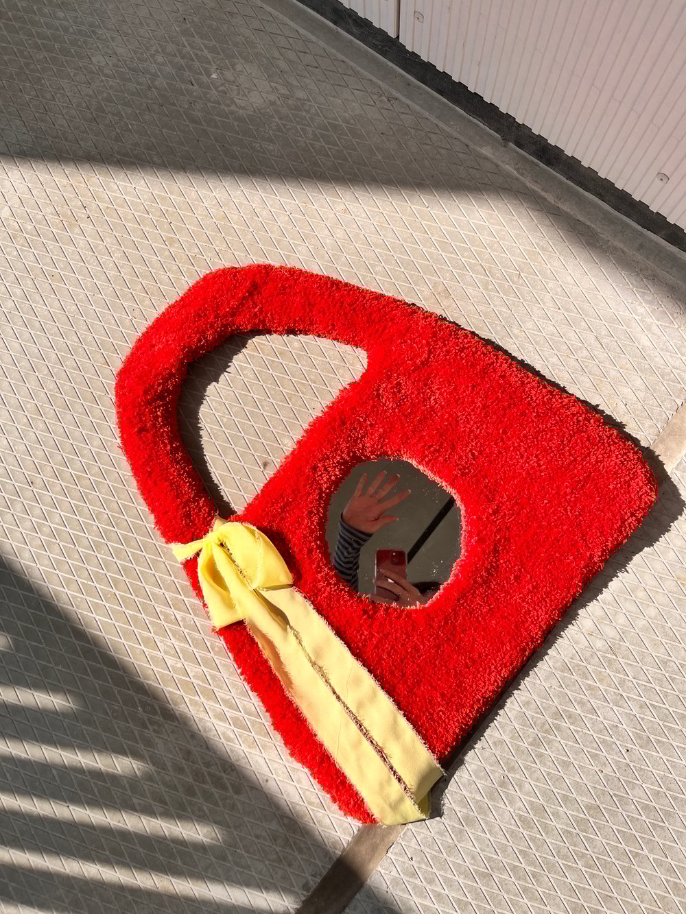 Image of Tufted red bag mirror 