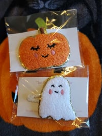 Pumpkin or Ghost snap clip. 