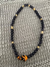 Image 1 of Black and Orange Elastic Beaded Necklace with Heart Charms