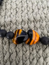 Image 2 of Black and Orange Elastic Beaded Necklace with Heart Charms