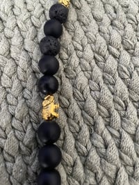 Image 3 of Black and Orange Elastic Beaded Necklace with Heart Charms