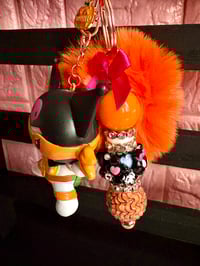 Image 3 of Copy of Hello kitty x Tmnt Kuromi Spooky keychain  with pink pompom 