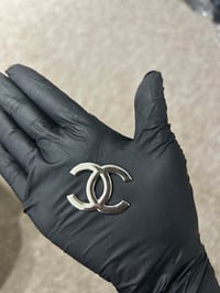 1x silver metal C.c charm (10 LEFT TO PURCHASE)