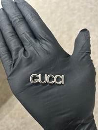 1 x silver g metal flat back charm.