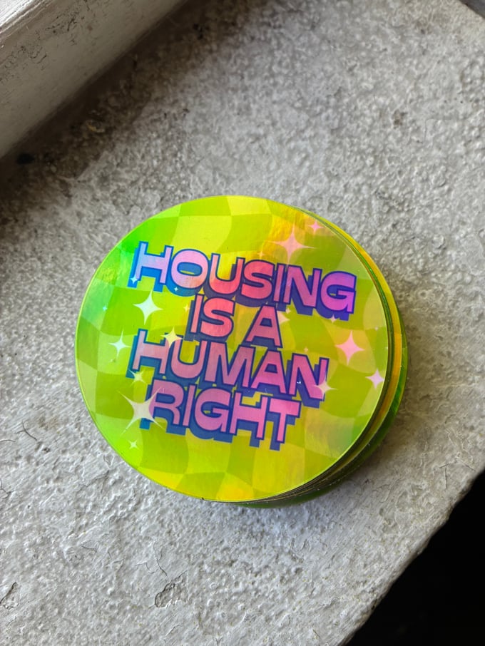 Image of Housing is a Human Right Holographic Sticker